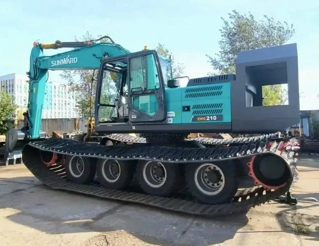 sunward-swe210-4-v-1-ekskavator-kran-svarochnyj-post-bolotohod